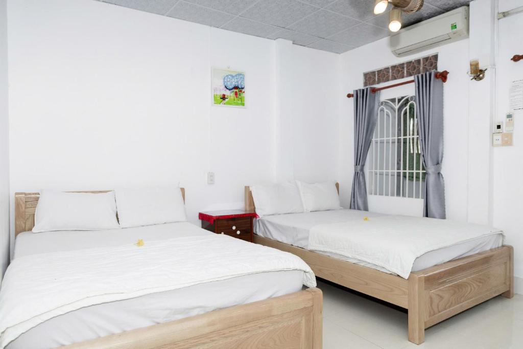 Giường trong phòng chung tại BinhYen Homestay