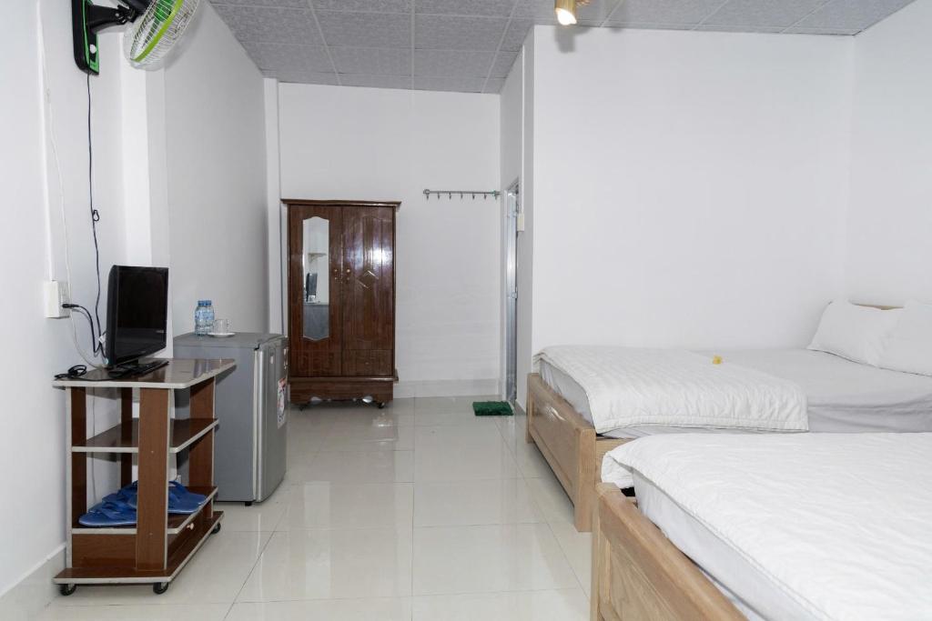 Giường trong phòng chung tại BinhYen Homestay