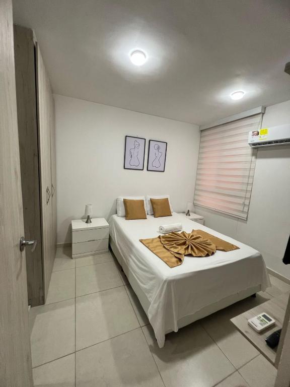 Postel nebo postele na pokoji v ubytování Hermoso Apartamento en Valledupar
