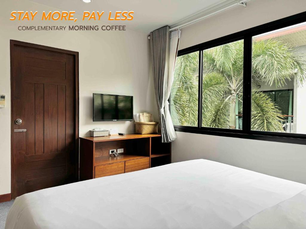 TV a/nebo společenská místnost v ubytování XAYA Pool Access Resort - Phuket