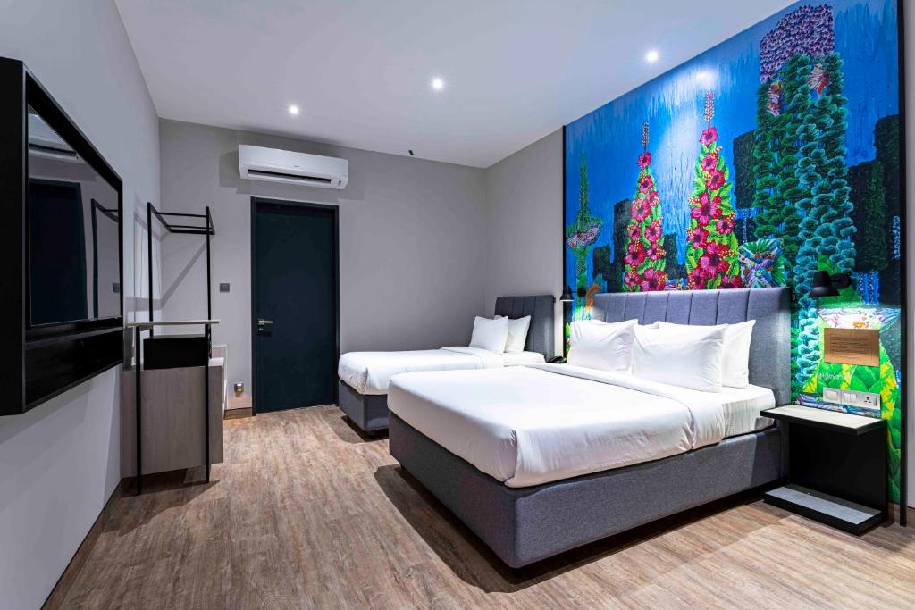Postel nebo postele na pokoji v ubytování ibis Styles Sepang KLIA