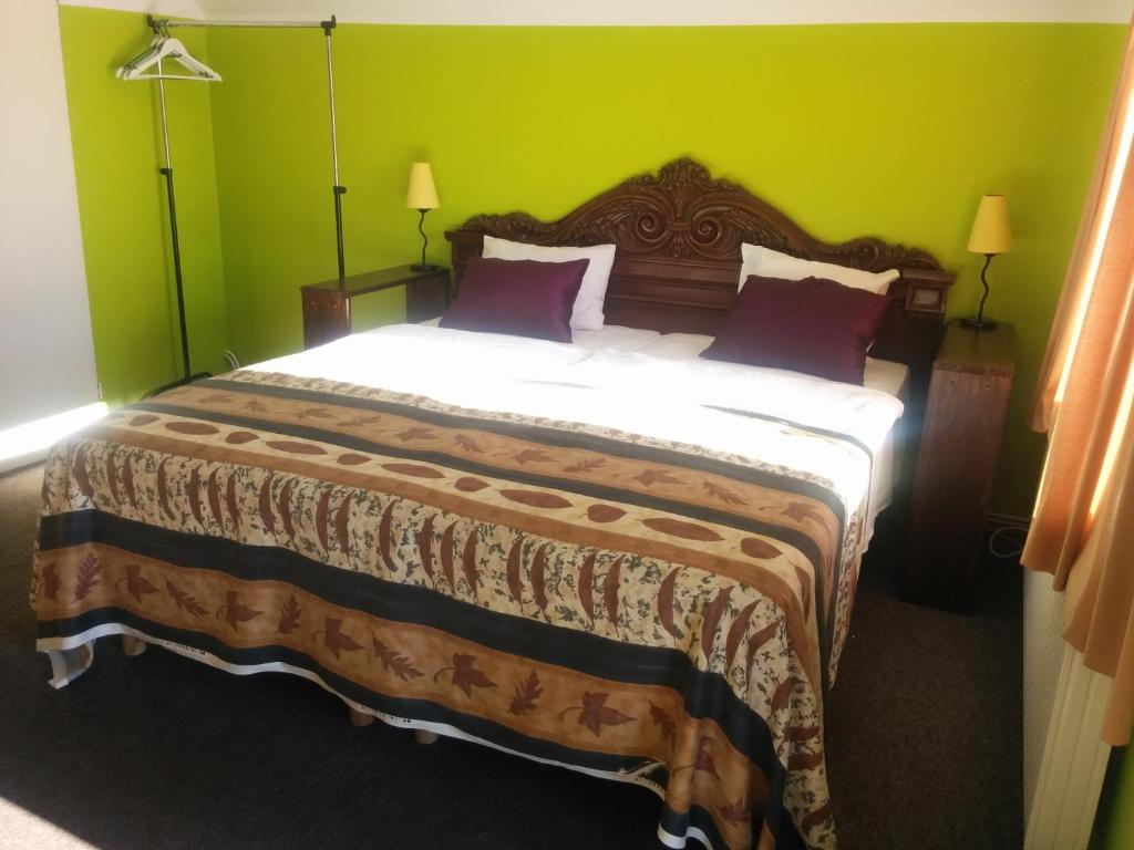 Postel nebo postele na pokoji v ubytování Hotel Getliin