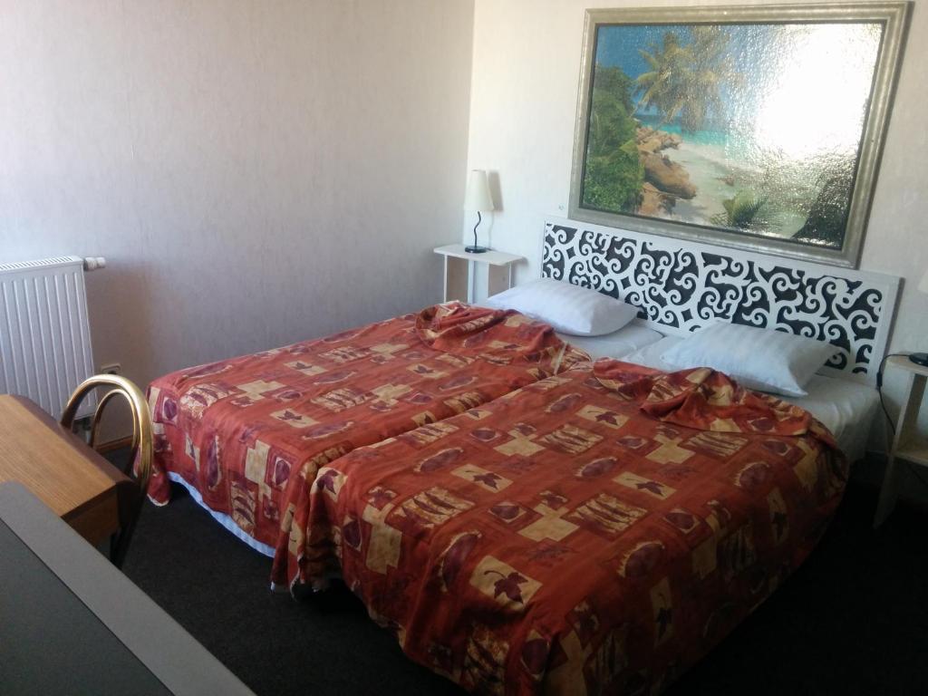 Postel nebo postele na pokoji v ubytování Hotel Getliin