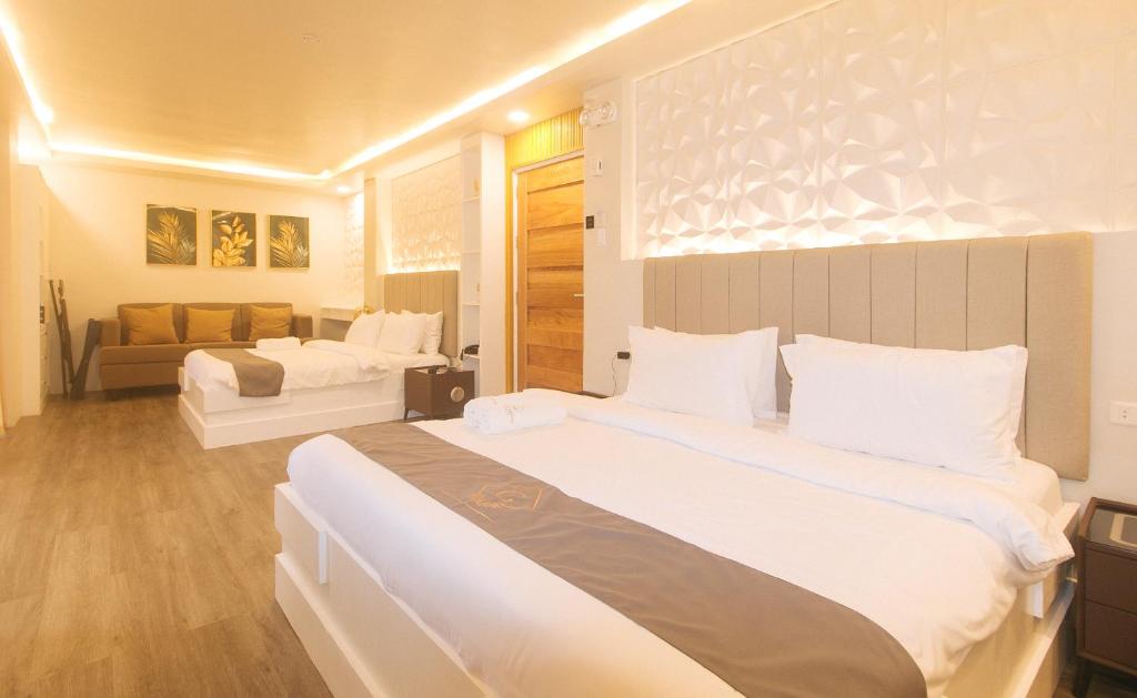 Postel nebo postele na pokoji v ubytování Grospe Resort Boracay by RedDoorz
