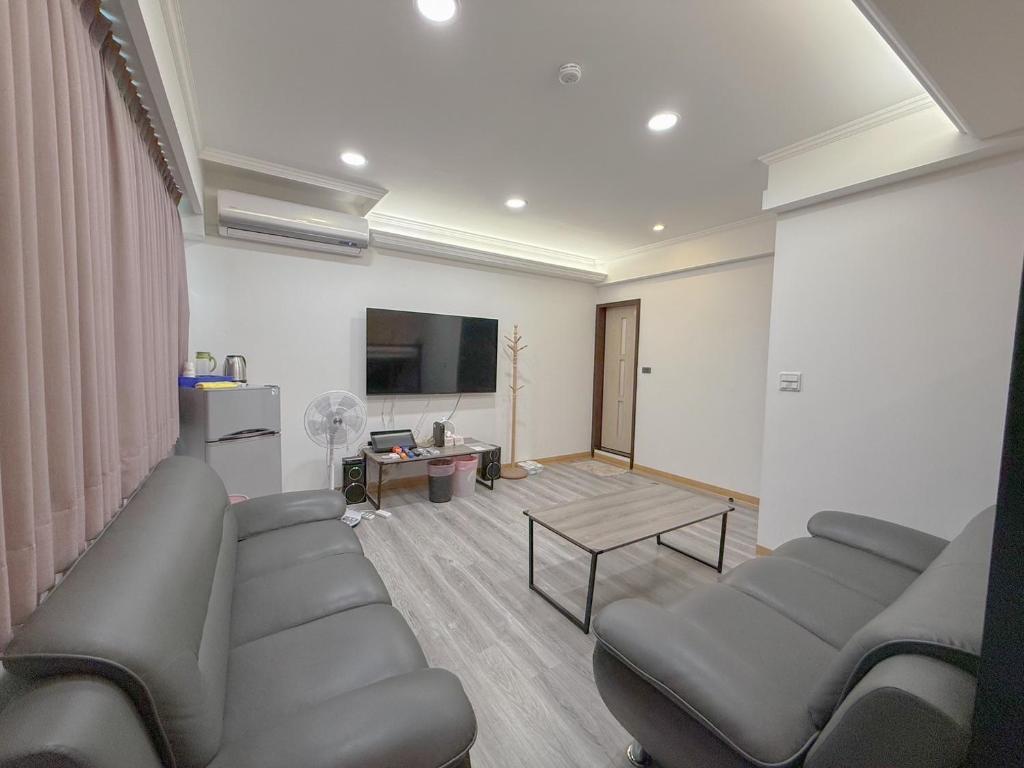 TV a/nebo společenská místnost v ubytování Tamshui Homestay