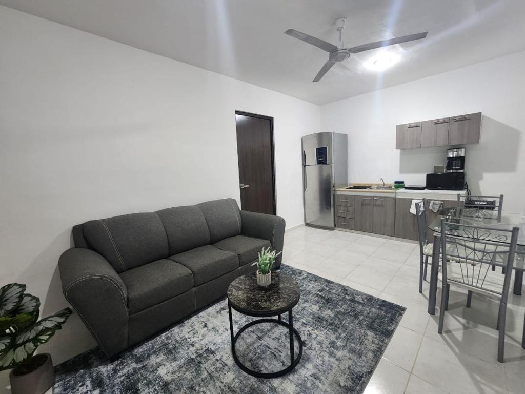 Kuchyň nebo kuchyňský kout v ubytování Hotel Suites La Maya
