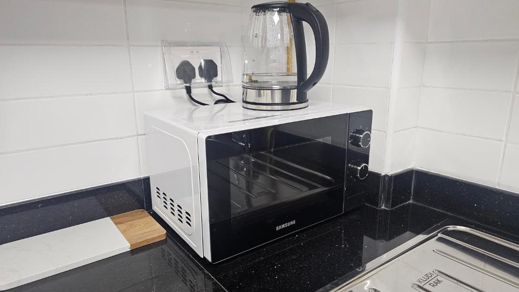 Kuchyň nebo kuchyňský kout v ubytování Unique studio E16