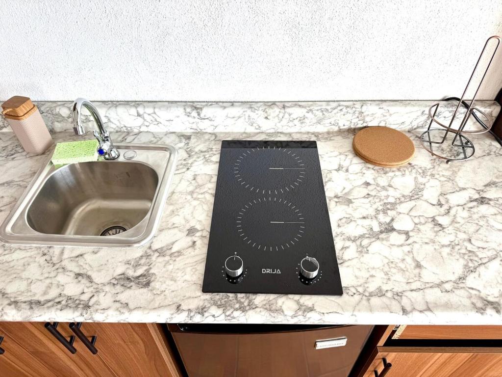 Η κουζίνα ή μικρή κουζίνα στο Colina de Tzancucha