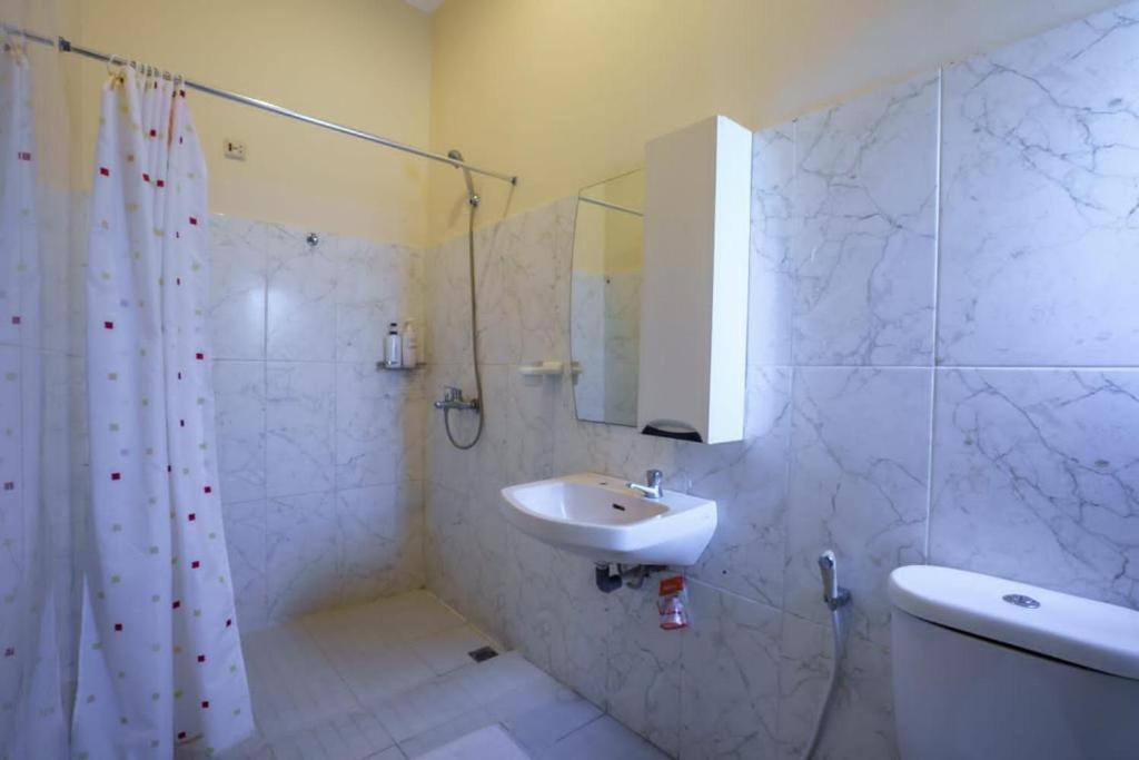 Koupelna v ubytování Whiterose Guesthouse