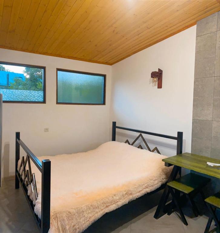 Postel nebo postele na pokoji v ubytování Green Garden B&B