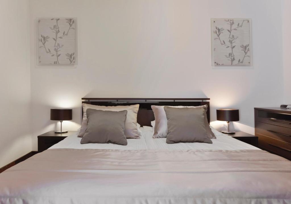 Posteľ alebo postele v izbe v ubytovaní Hotel Capitol