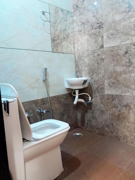 Koupelna v ubytování Hotel Mahadev Kripa