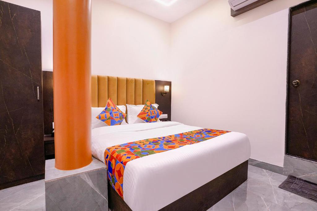 Postel nebo postele na pokoji v ubytování FabHotel Gateway