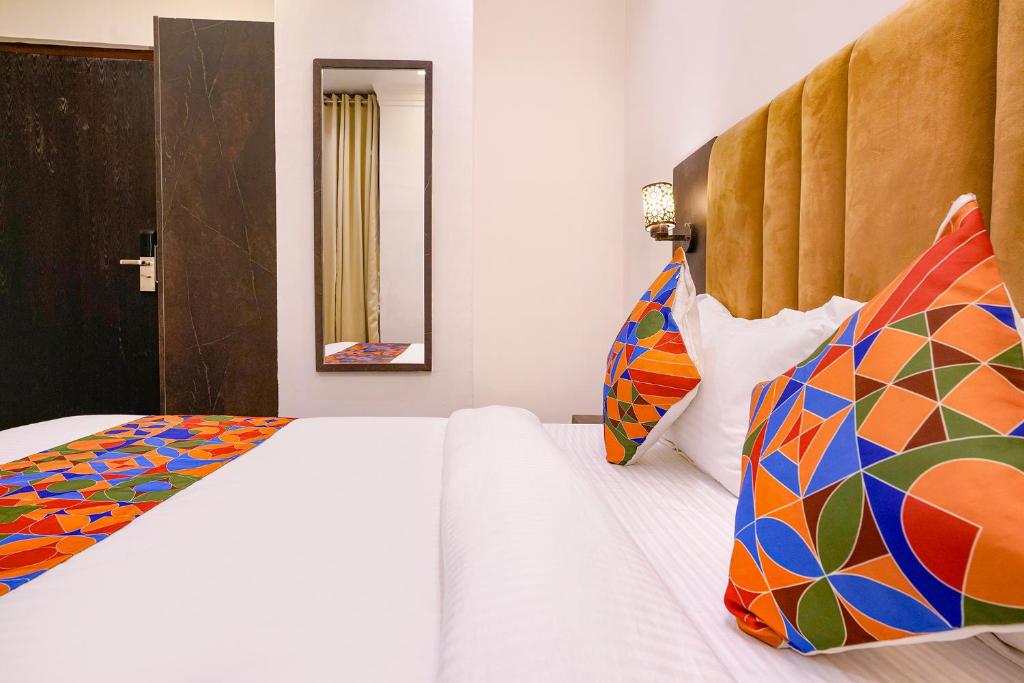 Postel nebo postele na pokoji v ubytování FabHotel Gateway