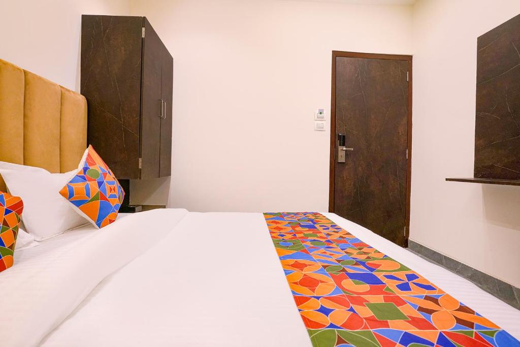 Postel nebo postele na pokoji v ubytování FabHotel Gateway