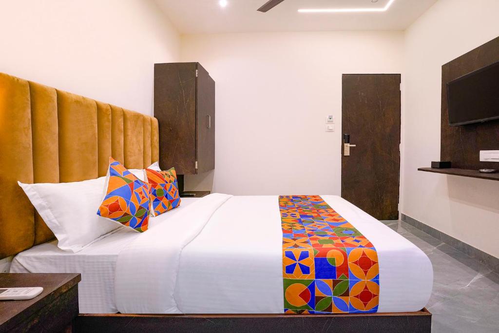 Postel nebo postele na pokoji v ubytování FabHotel Gateway