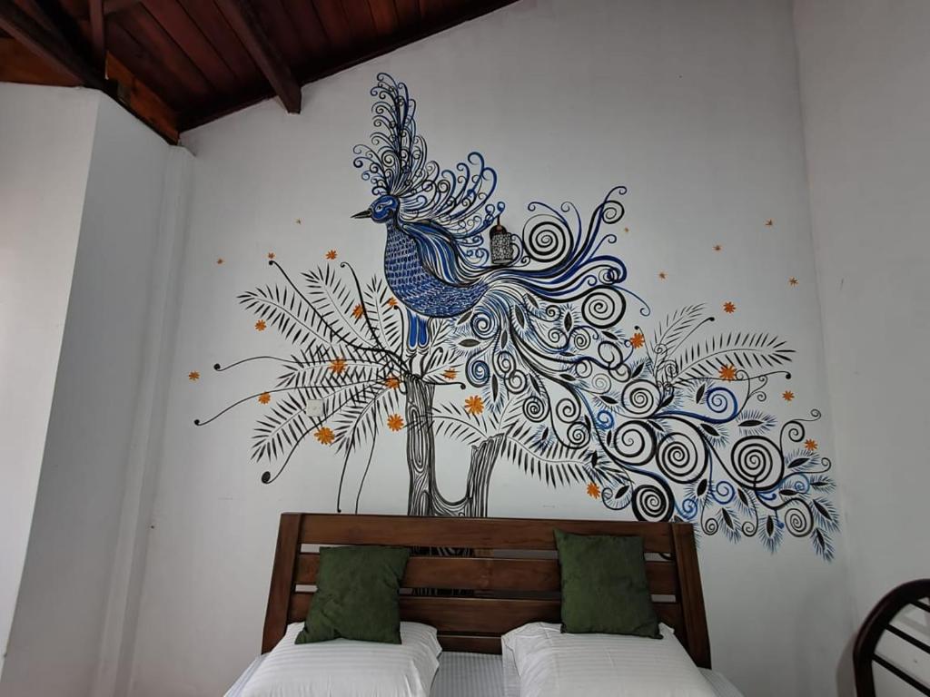 Postel nebo postele na pokoji v ubytování Prasanna Hotel and Rest