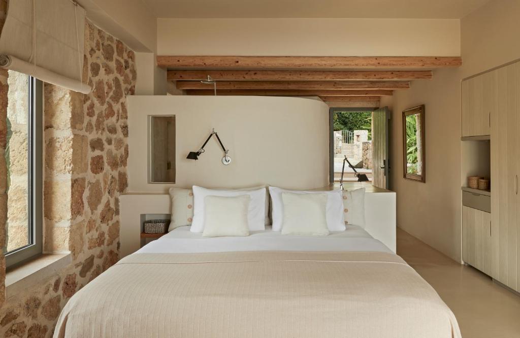Postel nebo postele na pokoji v ubytování F Zeen Kefalonia