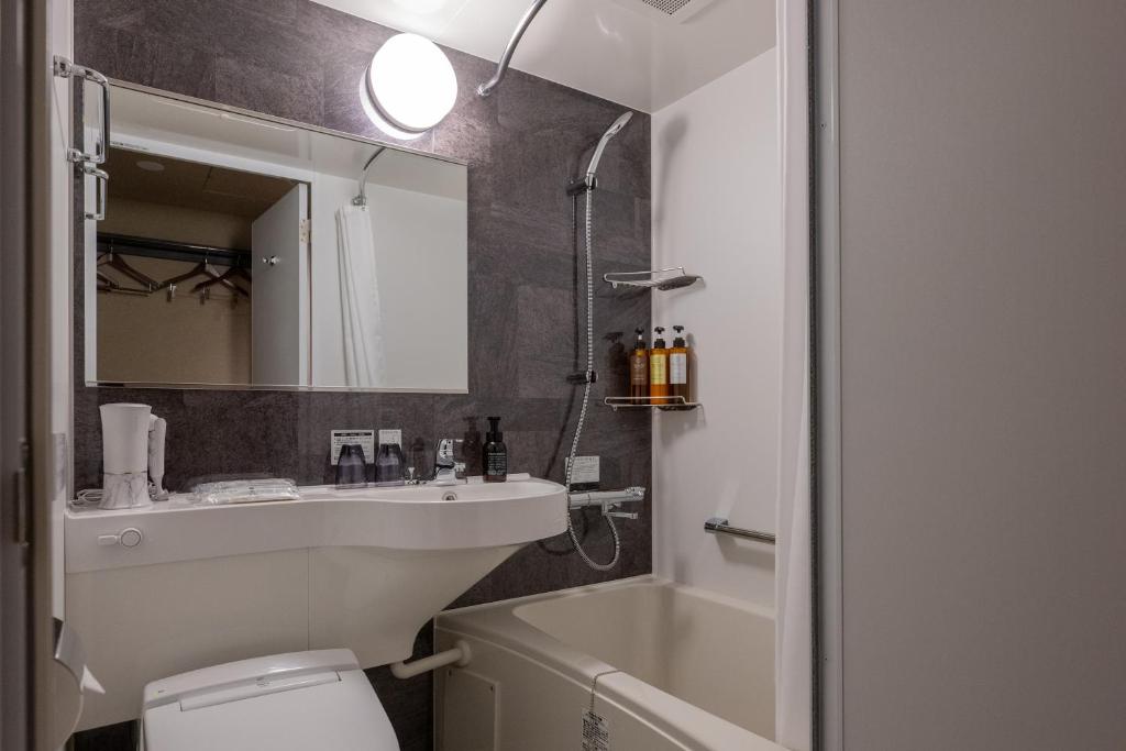 Koupelna v ubytování HOTEL R9 Premium Ichikawaekimae