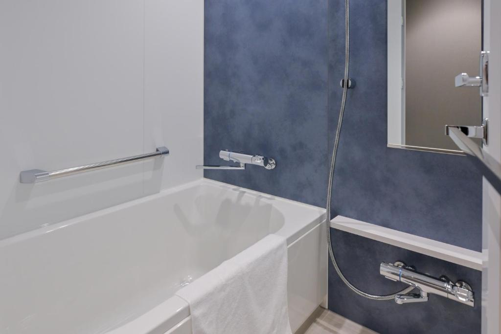 Koupelna v ubytování HOTEL R9 Premium Ichikawaekimae
