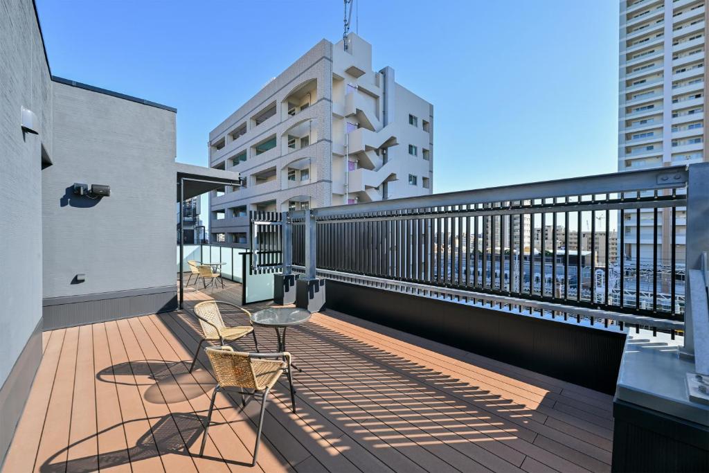 Balkón nebo terasa v ubytování HOTEL R9 Premium Ichikawaekimae