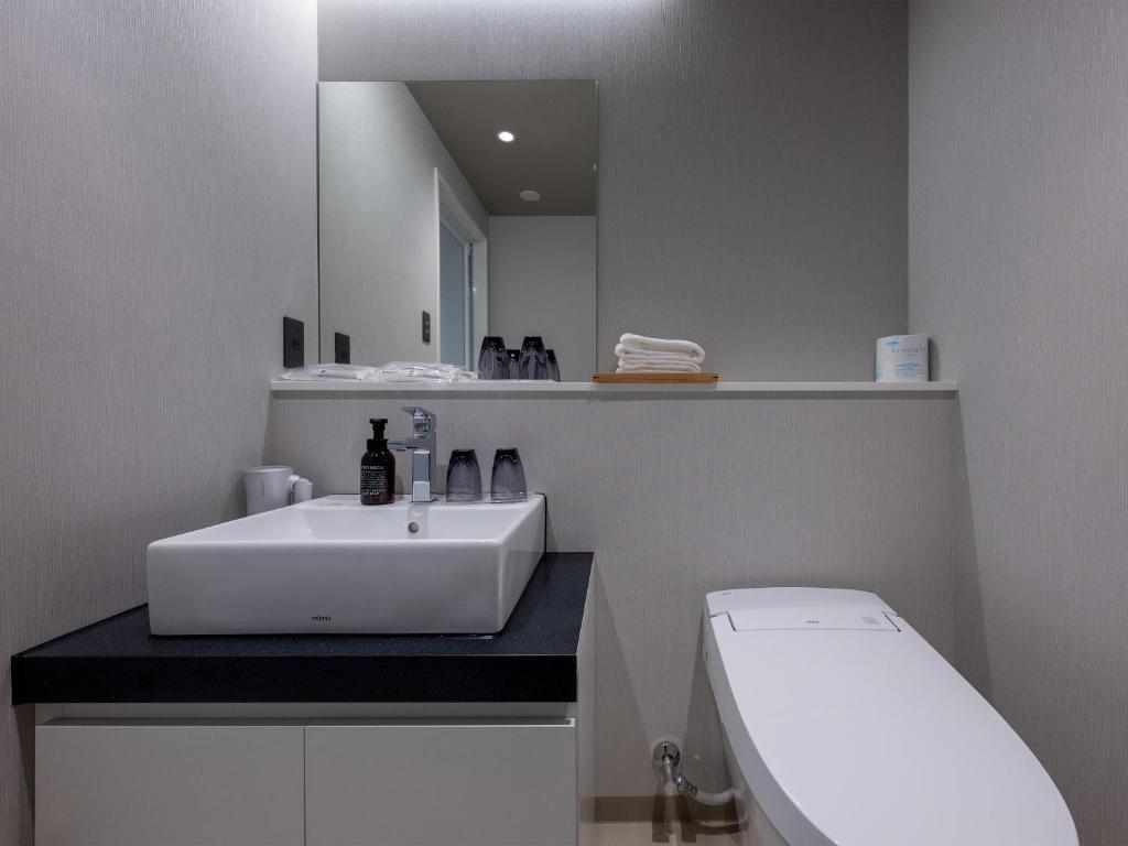 Koupelna v ubytování HOTEL R9 Premium Ichikawaekimae