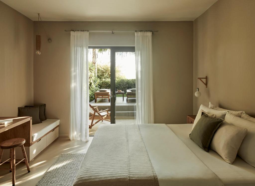 Postel nebo postele na pokoji v ubytování F Zeen Kefalonia