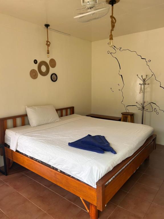 Postel nebo postele na pokoji v ubytování Tchin tchin Guesthouse