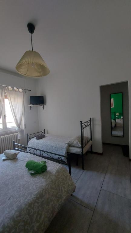 Postel nebo postele na pokoji v ubytování Locanda La Tana Del Luppolo