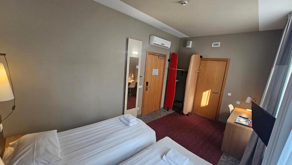 Postel nebo postele na pokoji v ubytování Ibis Riga Centre