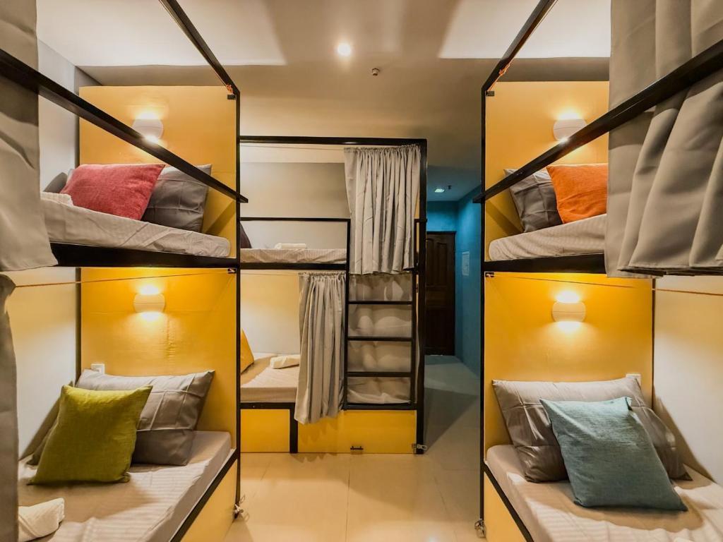 Postel nebo postele na pokoji v ubytování Goofy Ants Hostel