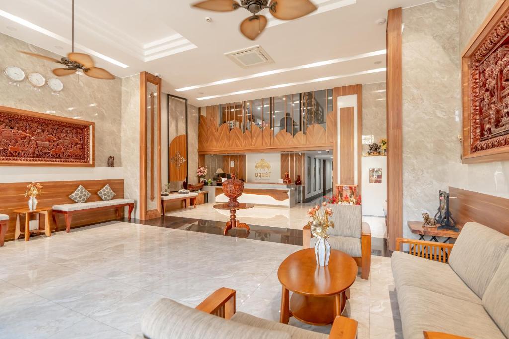 Postel nebo postele na pokoji v ubytování Botum Domrey Hotel