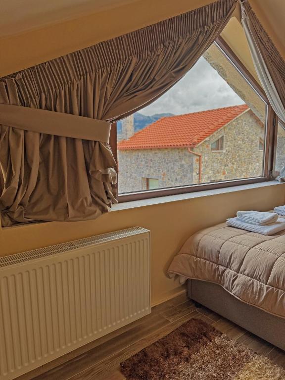 Postel nebo postele na pokoji v ubytování Kallisto villas