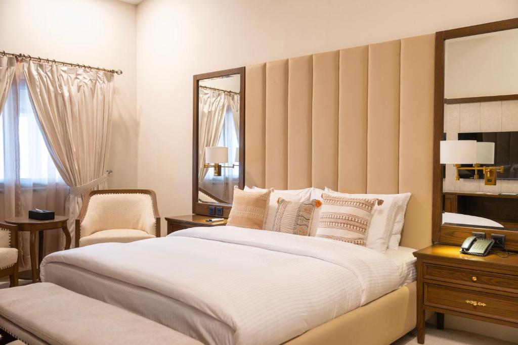 Postel nebo postele na pokoji v ubytování K2 Hotel by Green Pak Skardu