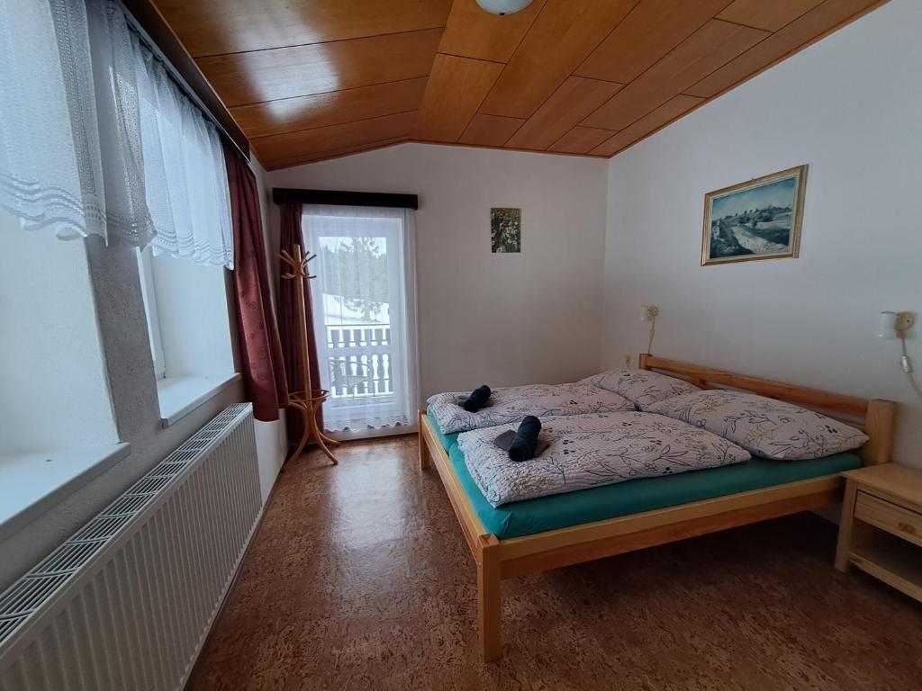 Postel nebo postele na pokoji v ubytování Penzion Pochop