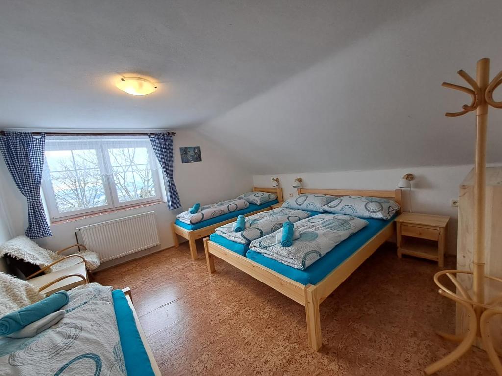 Postel nebo postele na pokoji v ubytování Penzion Pochop