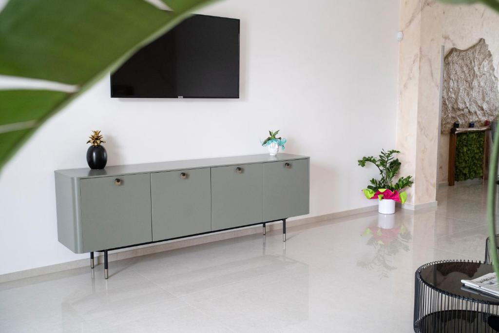 TV a/nebo společenská místnost v ubytování Pietra Viva Suite e Relax