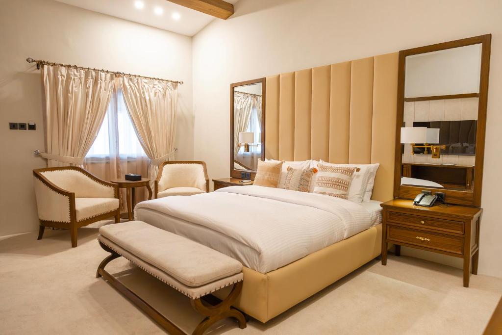 Postel nebo postele na pokoji v ubytování K2 Hotel by Green Pak Skardu