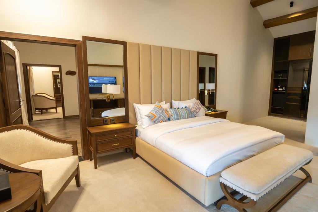 Postel nebo postele na pokoji v ubytování K2 Hotel by Green Pak Skardu