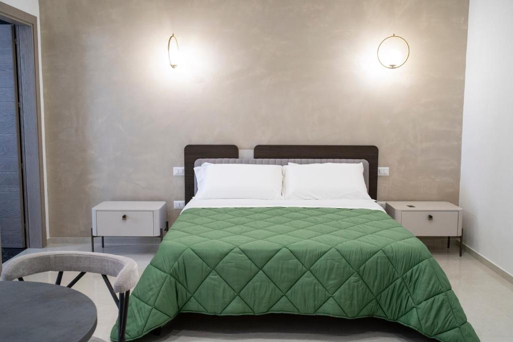 Postel nebo postele na pokoji v ubytování Pietra Viva Suite e Relax