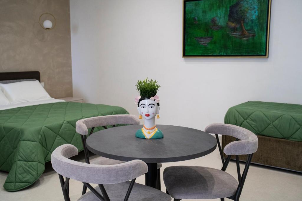 Postel nebo postele na pokoji v ubytování Pietra Viva Suite e Relax