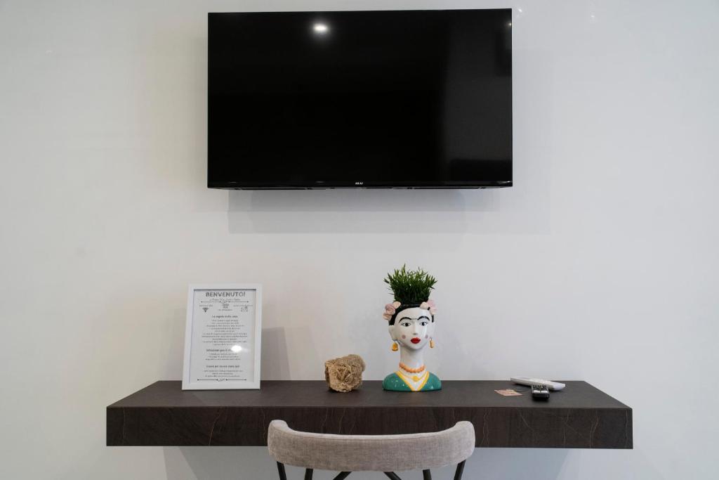 TV a/nebo společenská místnost v ubytování Pietra Viva Suite e Relax
