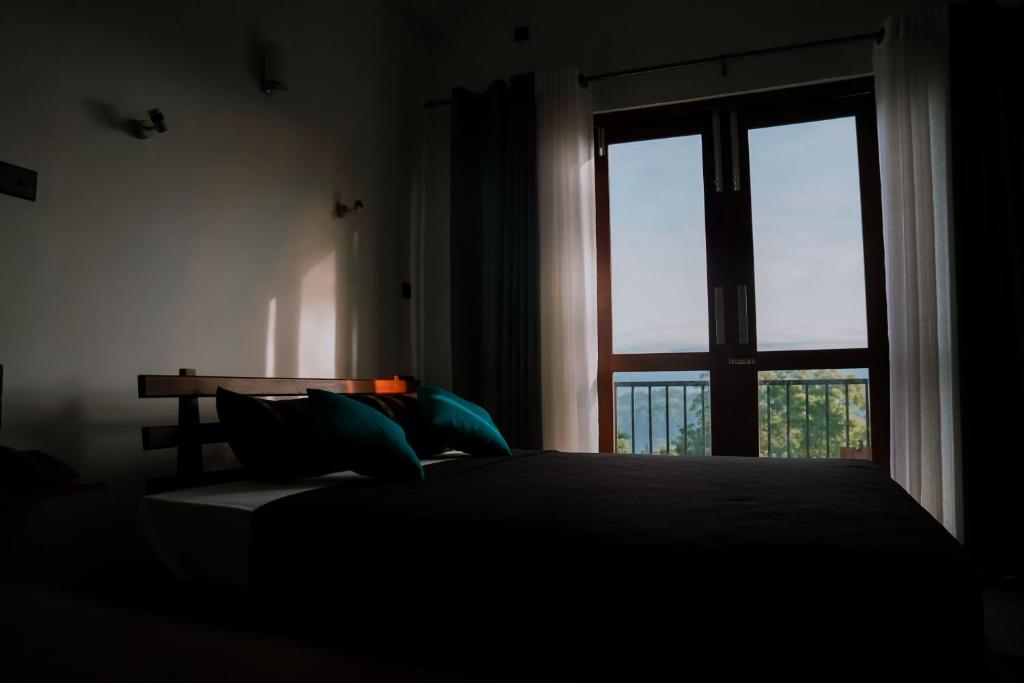 Postel nebo postele na pokoji v ubytování Golden sky Residence