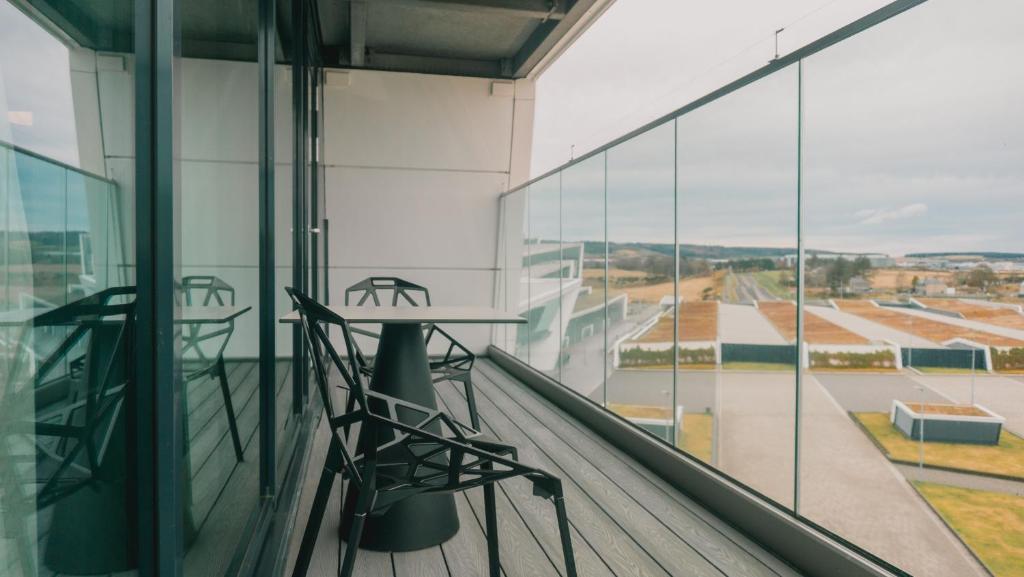 
King Suite with Balcony and Lounge Access
