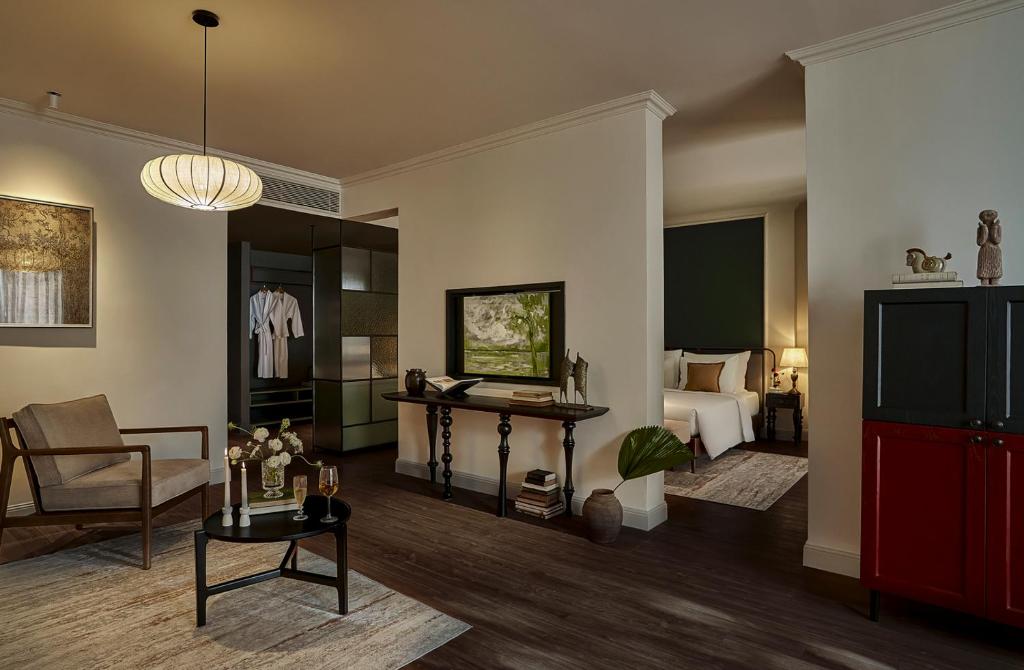 Giường trong phòng chung tại Signature by M Village Danang Heritage, A modern luxury stay