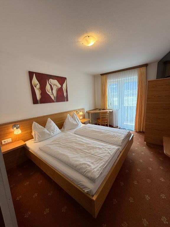 Postel nebo postele na pokoji v ubytování Pension Plattenhof