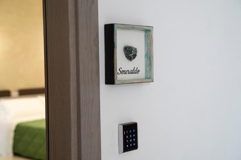 Postel nebo postele na pokoji v ubytování Pietra Viva Suite e Relax