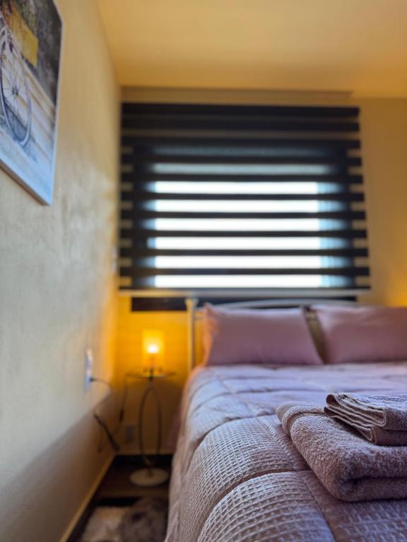 Postel nebo postele na pokoji v ubytování Kallisto villas
