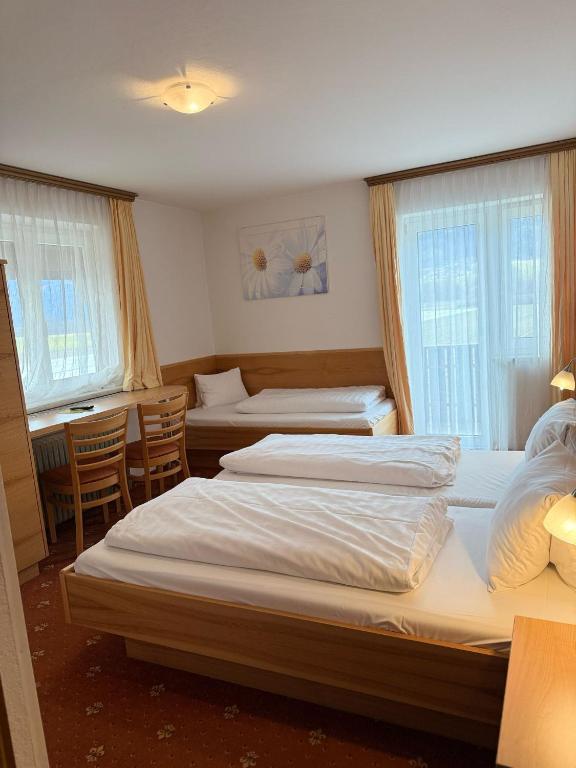Postel nebo postele na pokoji v ubytování Pension Plattenhof