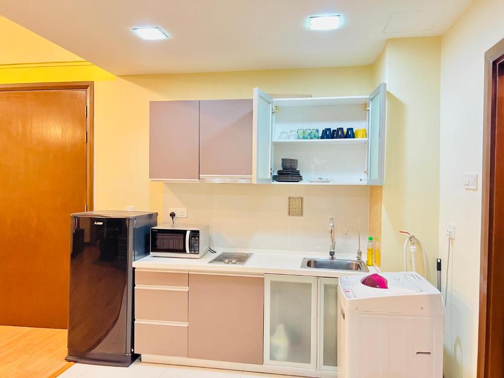 Kuchyň nebo kuchyňský kout v ubytování Regalia Spritz Empire Hostel